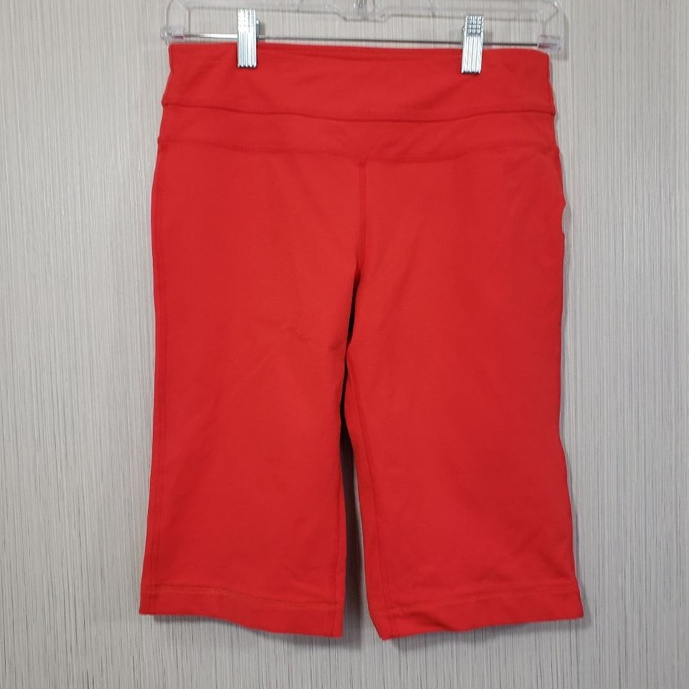PrAna orange biker shorts / knee length athletic shorts woman's size small